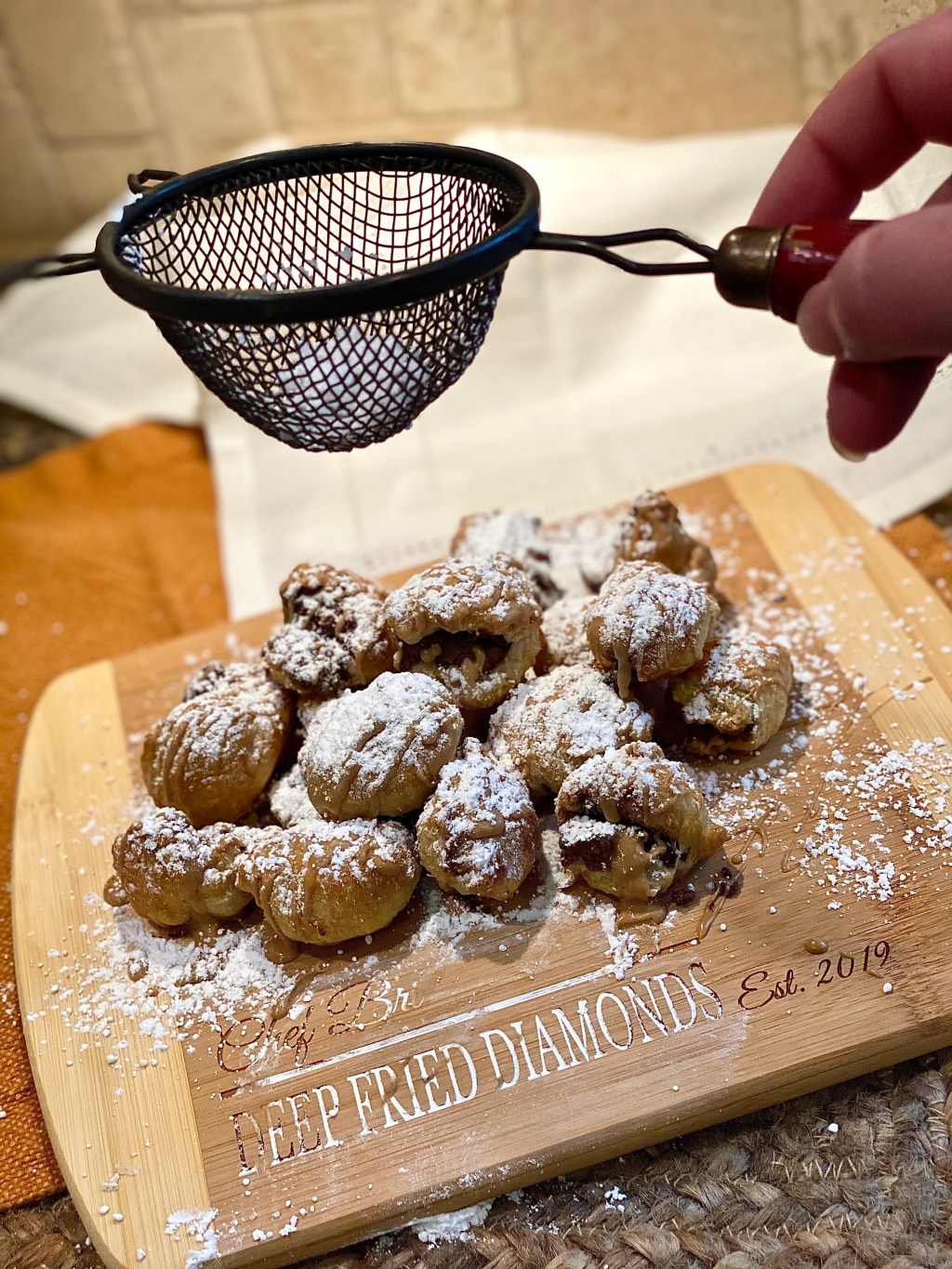 NUTELLA NUGGETS Drizzled With Melted Peanut Butter And Sprinkled With Powdered&nbsp;Sugar.
