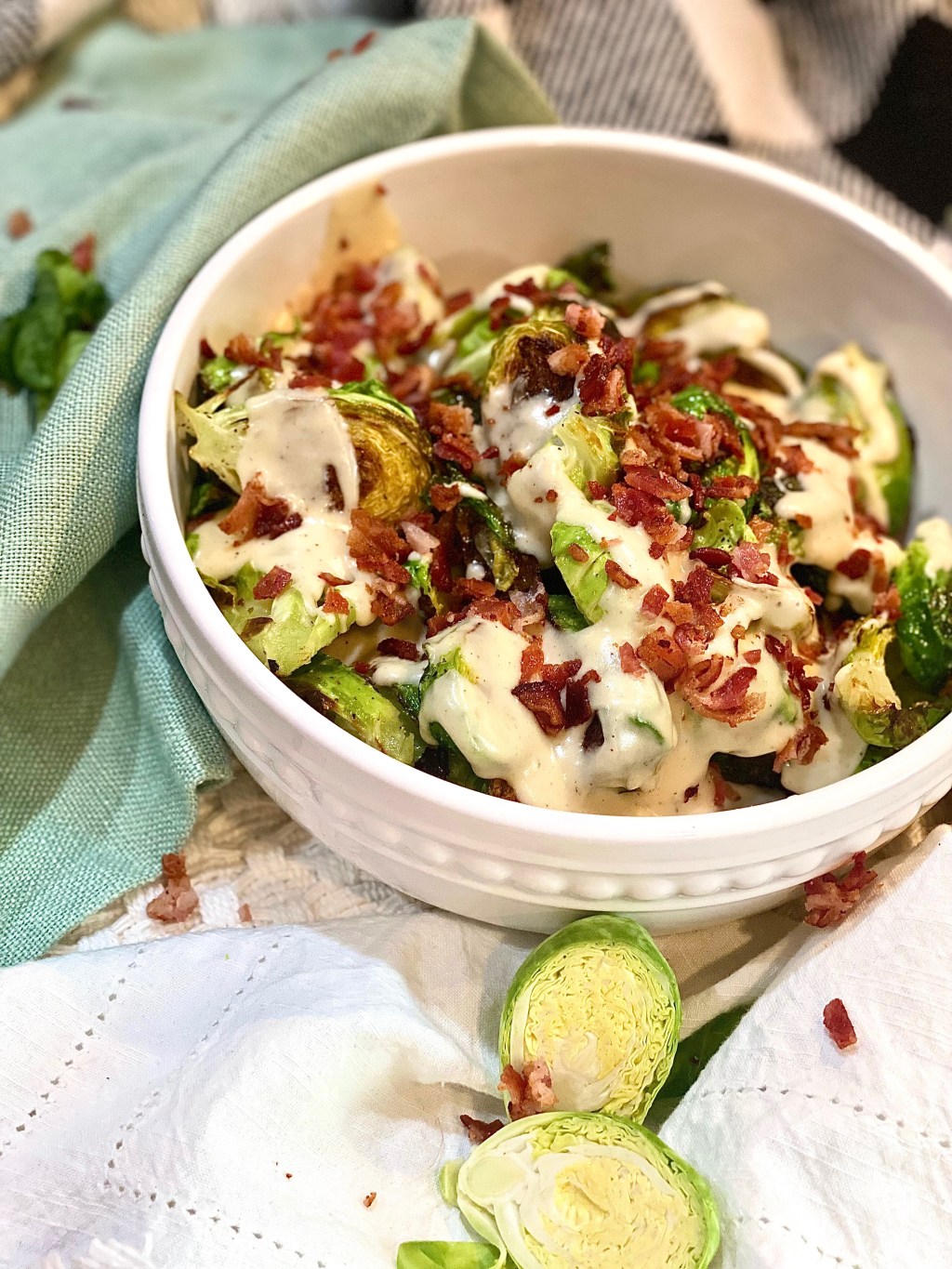 Fried Brussels Sprouts With A Peppered Cheese Sauce And Homemade Bacon&nbsp;Bits.